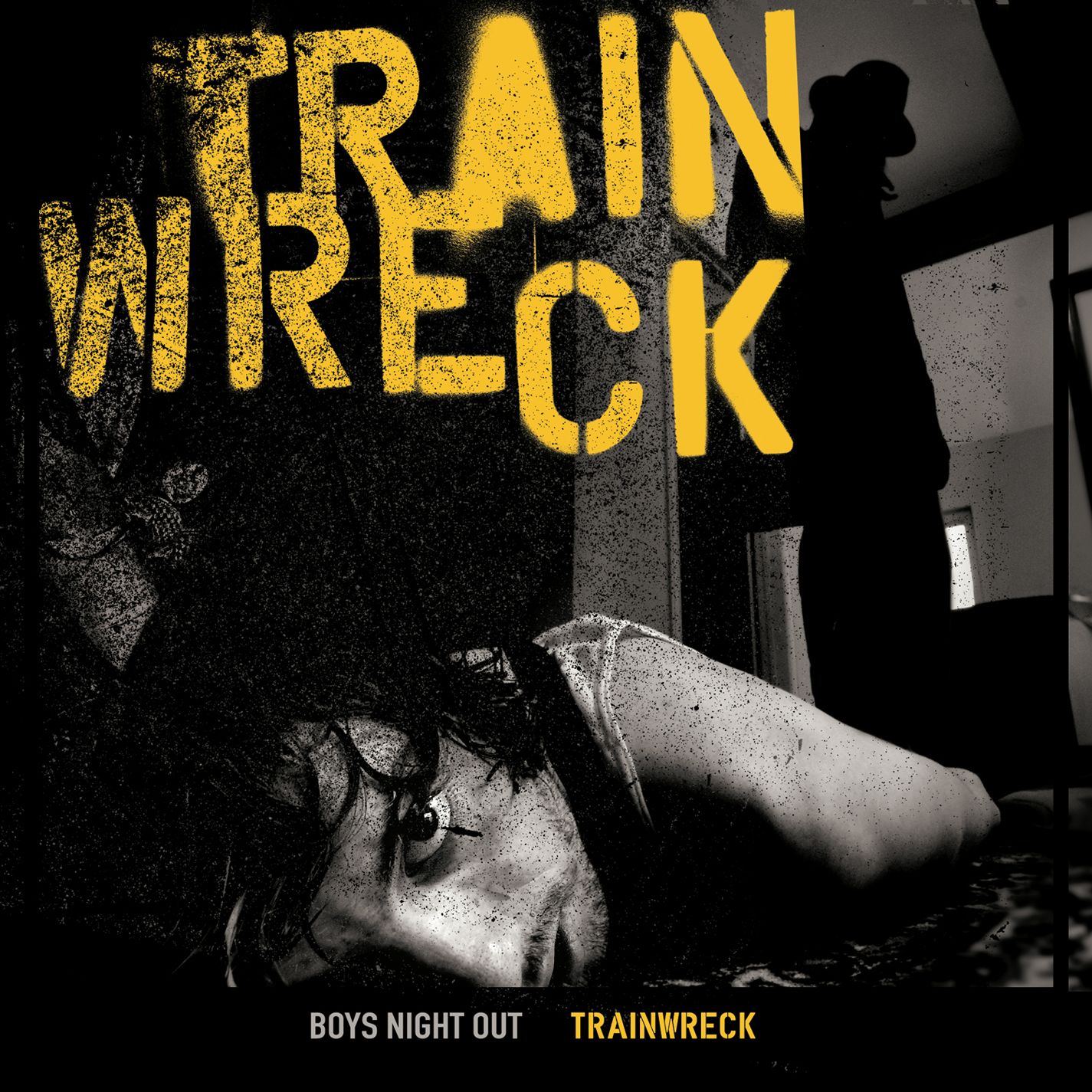 Trainwreck by Boys Night Out; in a greyscale filter, someone lays face down on the floor while a black silhouette watches